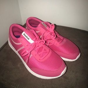 Pink and White Reebok sneakers